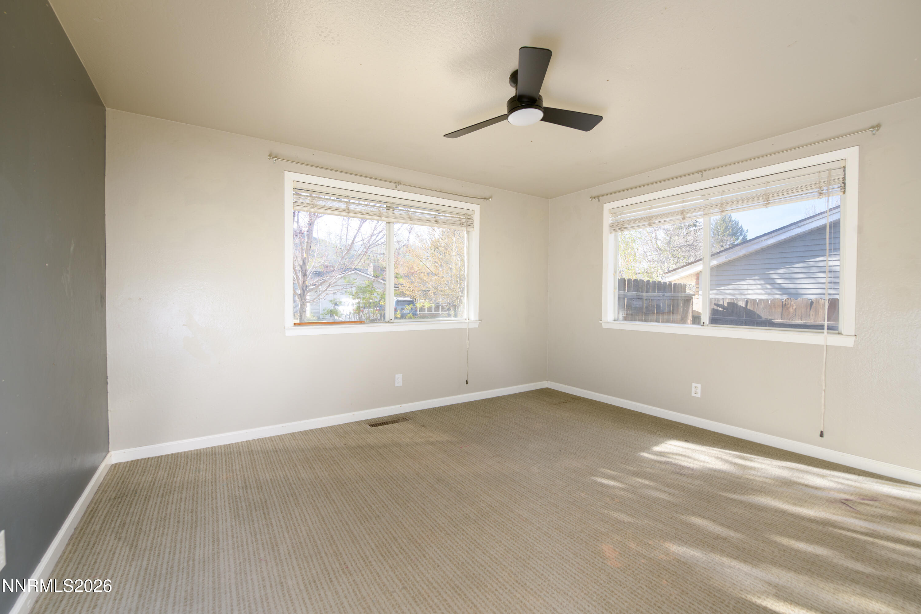 901 Sharrow Way Carson City, NV 89703 - Photo 23 of 45 a view of empty room with windows