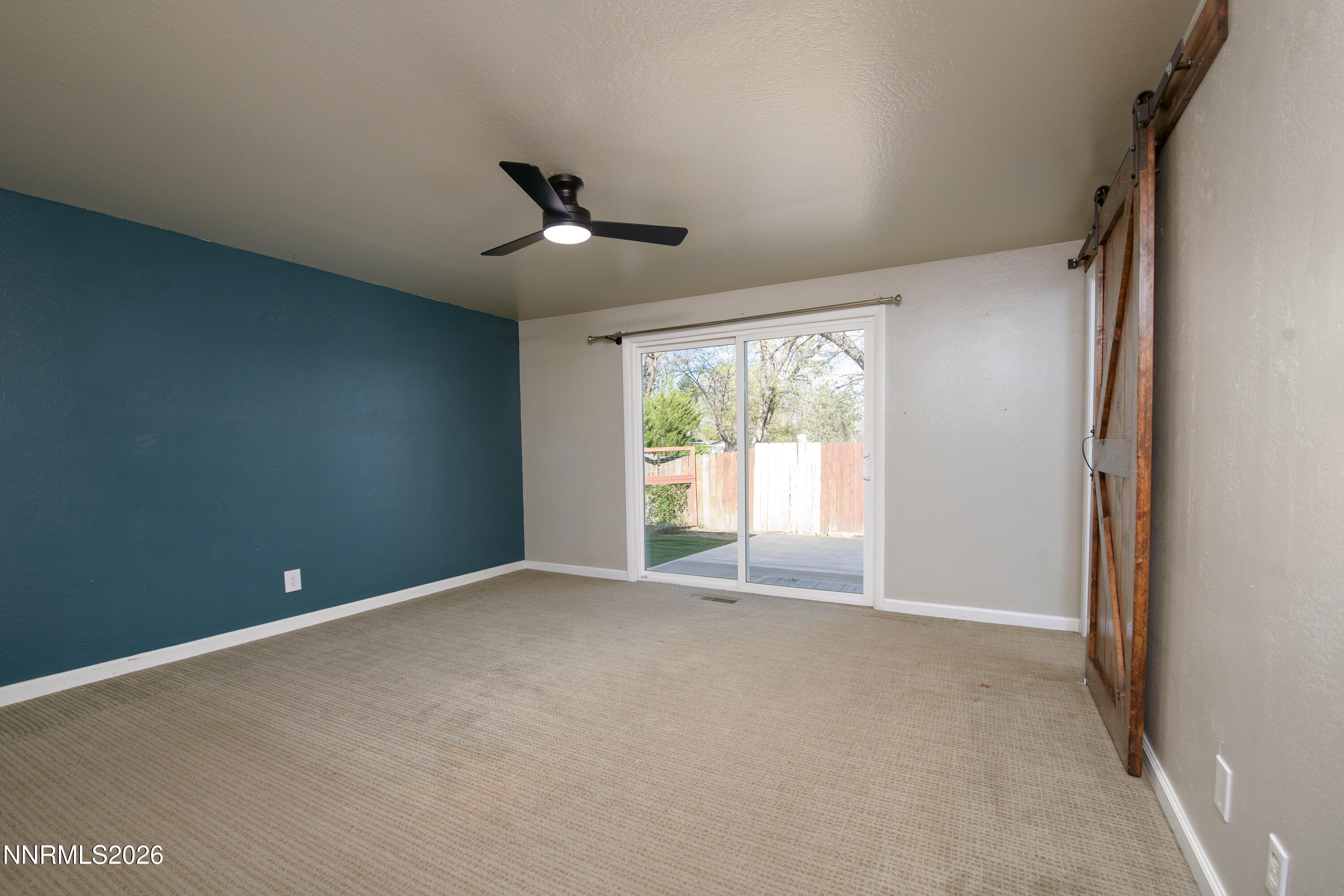 901 Sharrow Way Carson City, NV 89703 - Photo 26 of 45 a view of an empty room with a window