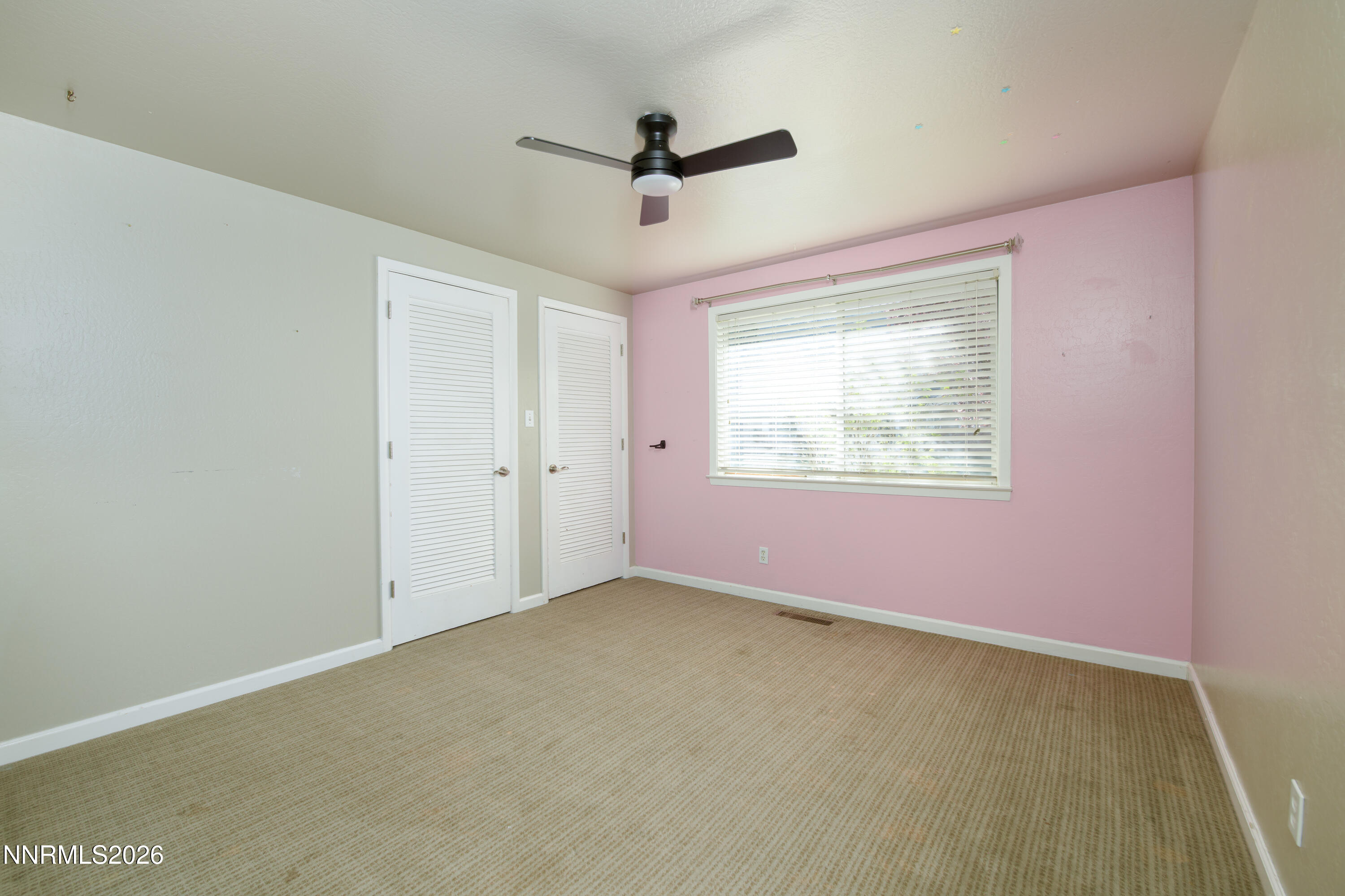 901 Sharrow Way Carson City, NV 89703 - Photo 28 of 45 a view of an empty room with a window