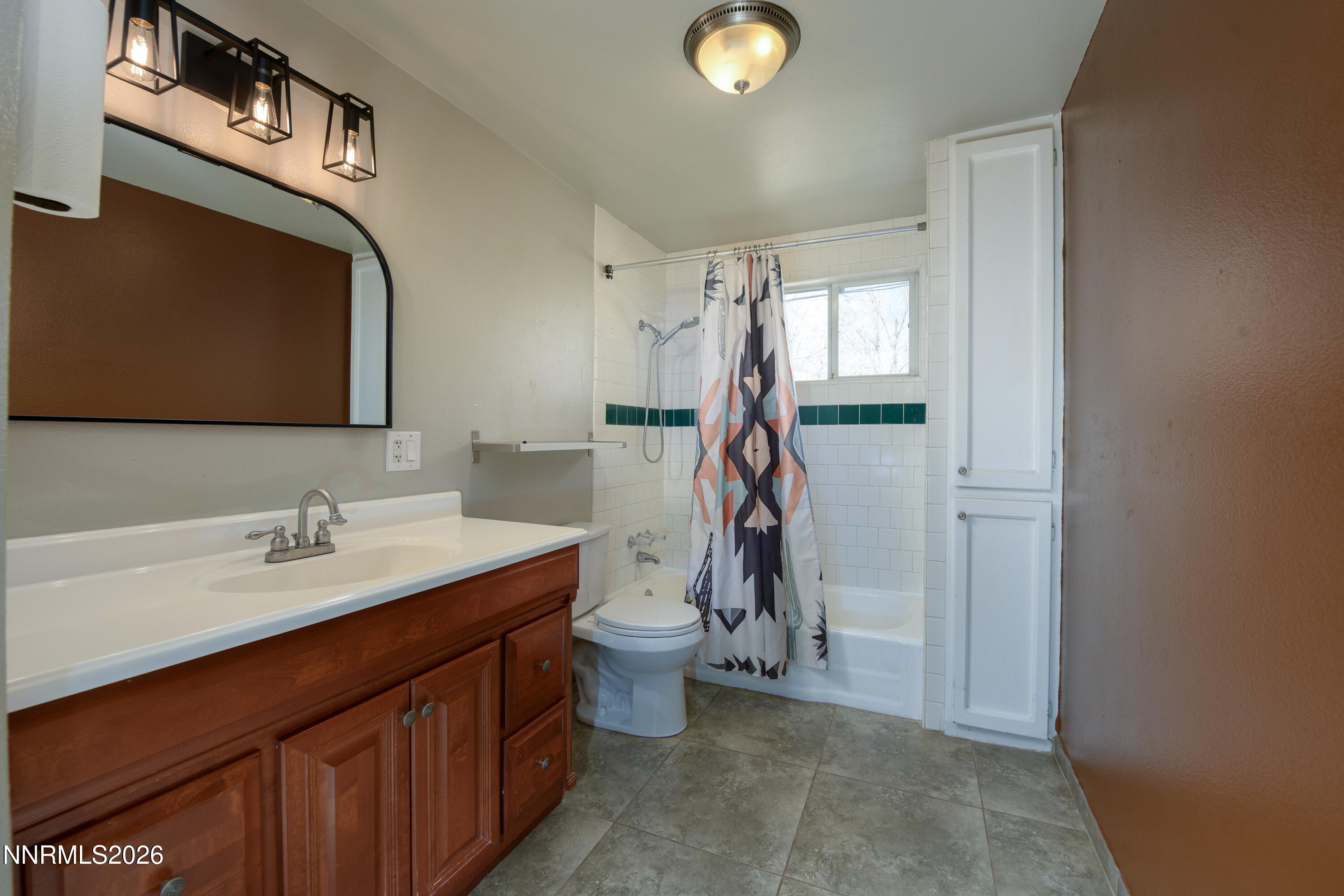 901 Sharrow Way Carson City, NV 89703 - Photo 29 of 45 a bathroom with a double vanity sink mirror and toilet