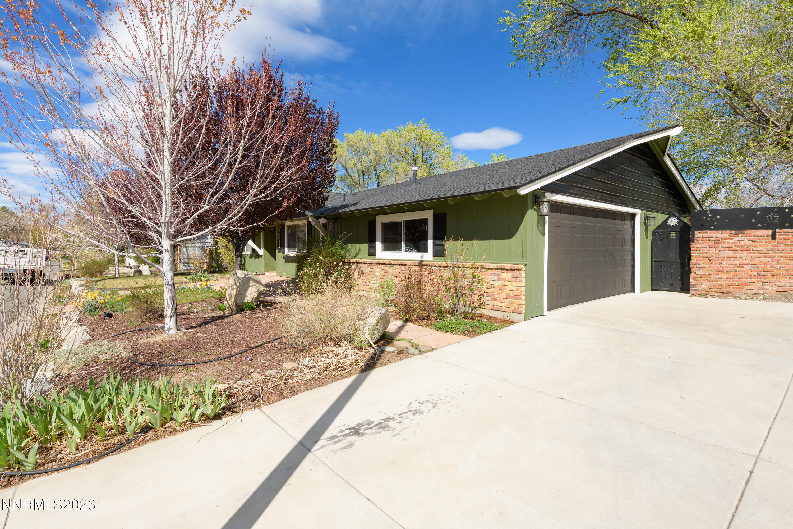 901 Sharrow Way Carson City, NV 89703 - Photo 35 of 45 a view of a house with a yard