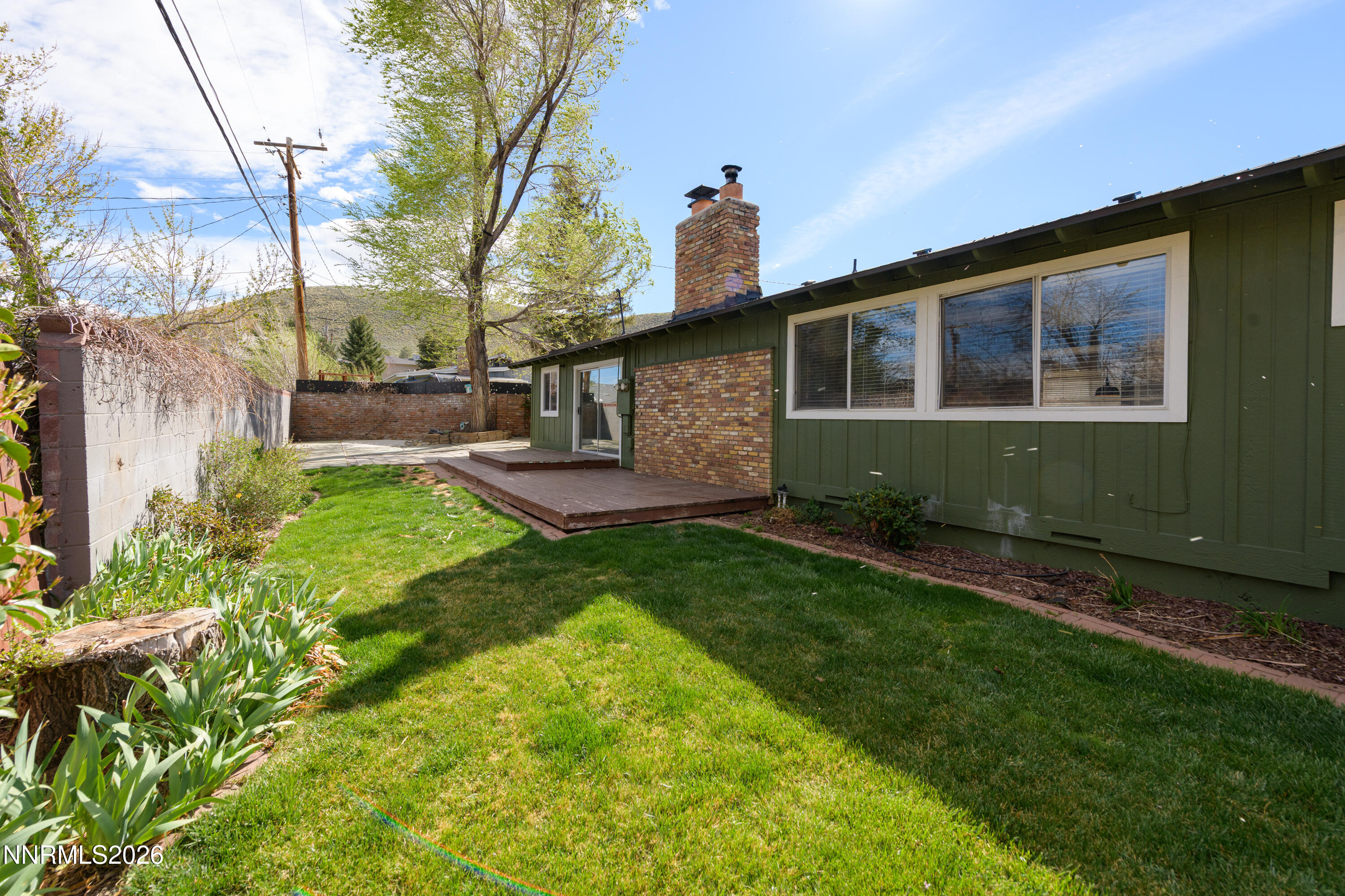 901 Sharrow Way Carson City, NV 89703 - Photo 43 of 45 a front view of a house with garden