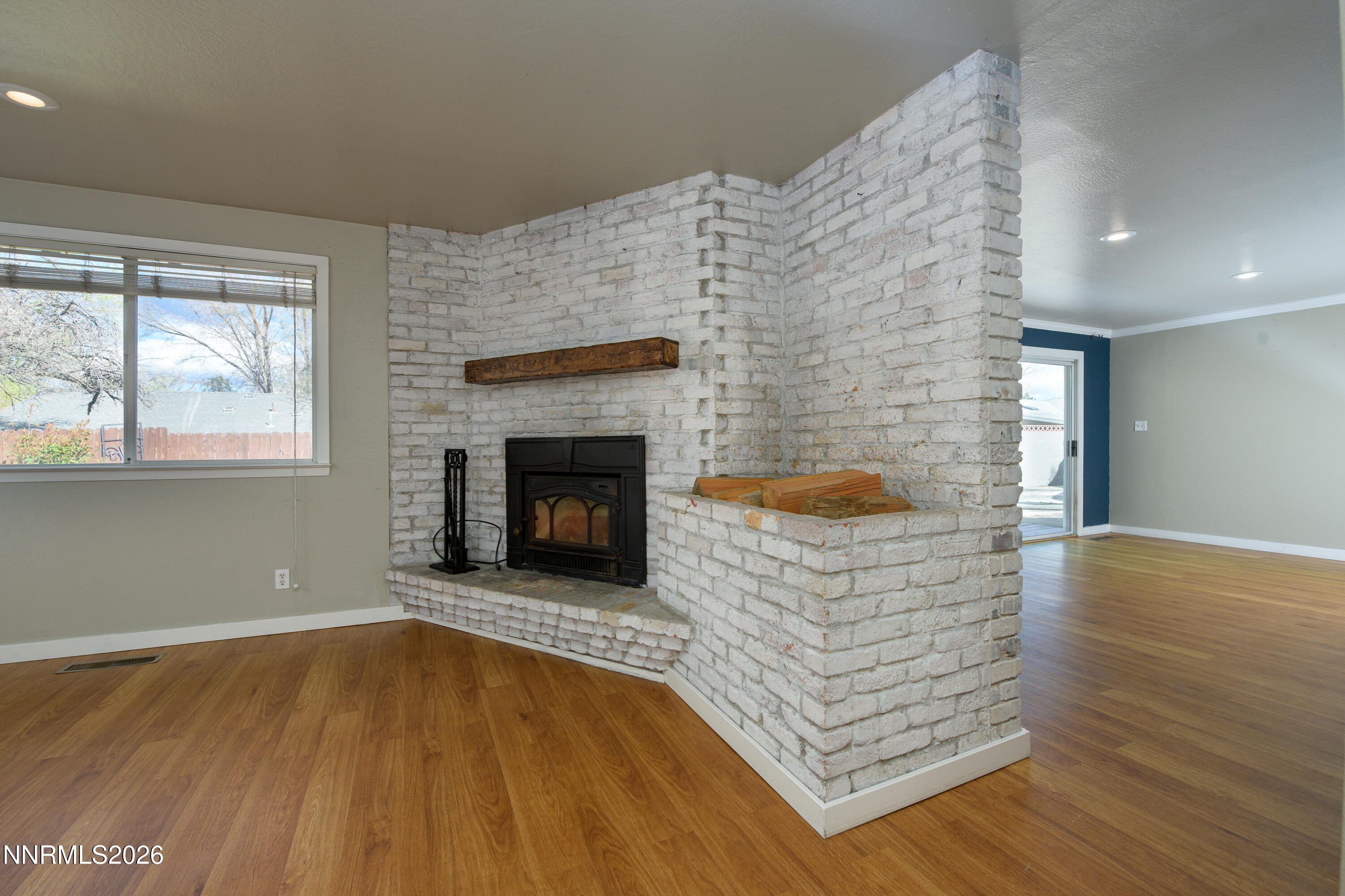 901 Sharrow Way Carson City, NV 89703 - Photo 8 of 45 a living room with furniture and a fireplace