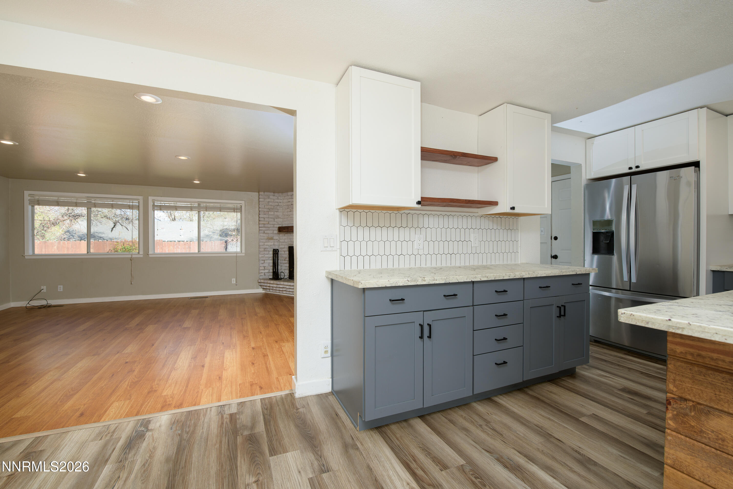 901 Sharrow Way Carson City, NV 89703 - Photo 9 of 45 a spacious bathroom with a granite countertop sink and a mirror