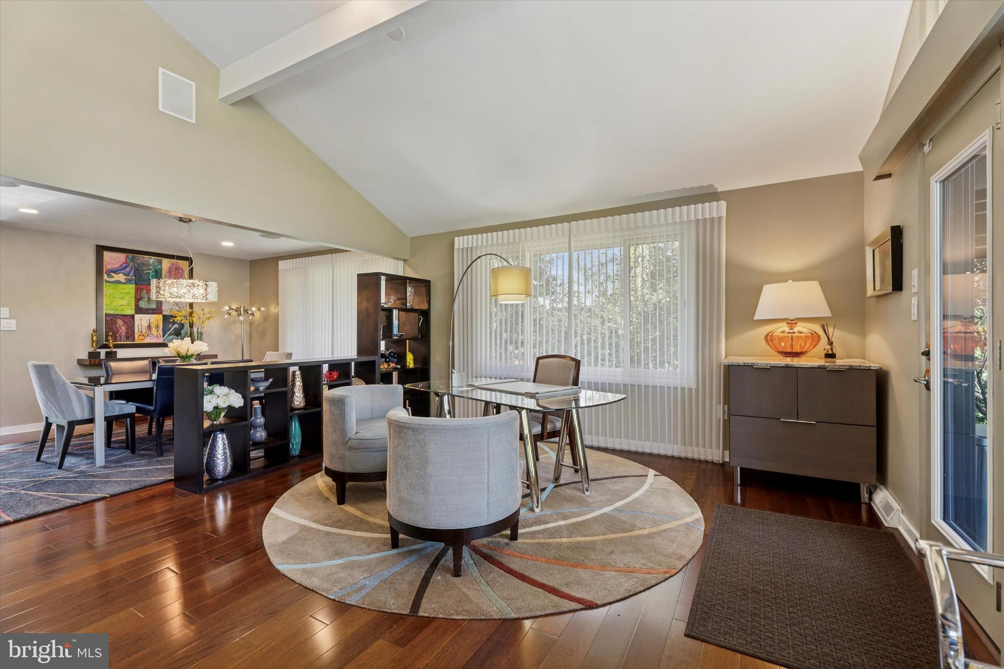 1641 Chattin Road Glenside, PA 19038 - Photo 18 of 48 a living room with furniture and a dining table