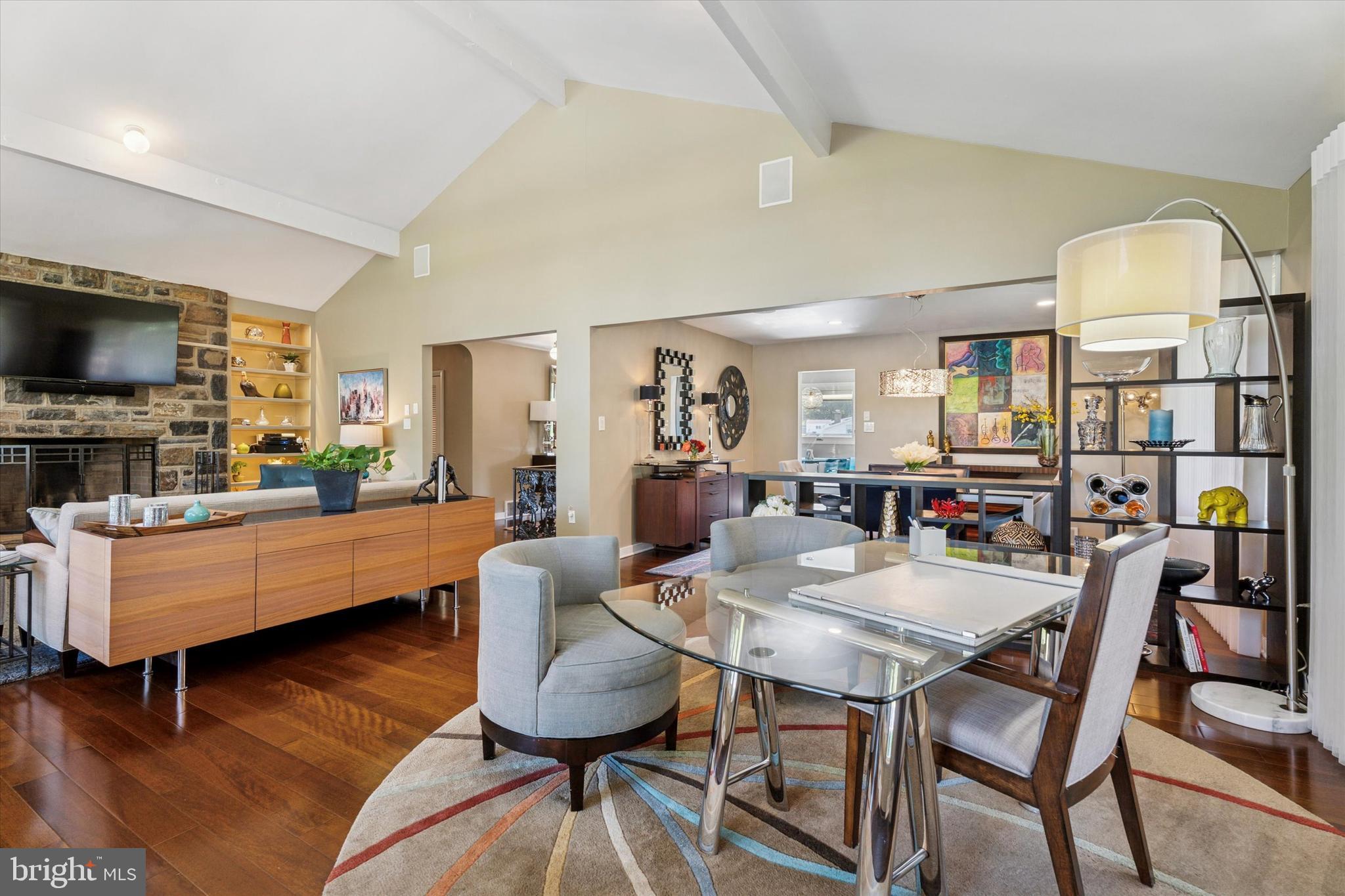 1641 Chattin Road Glenside, PA 19038 - Photo 20 of 48 a living room with fireplace furniture and a flat screen tv