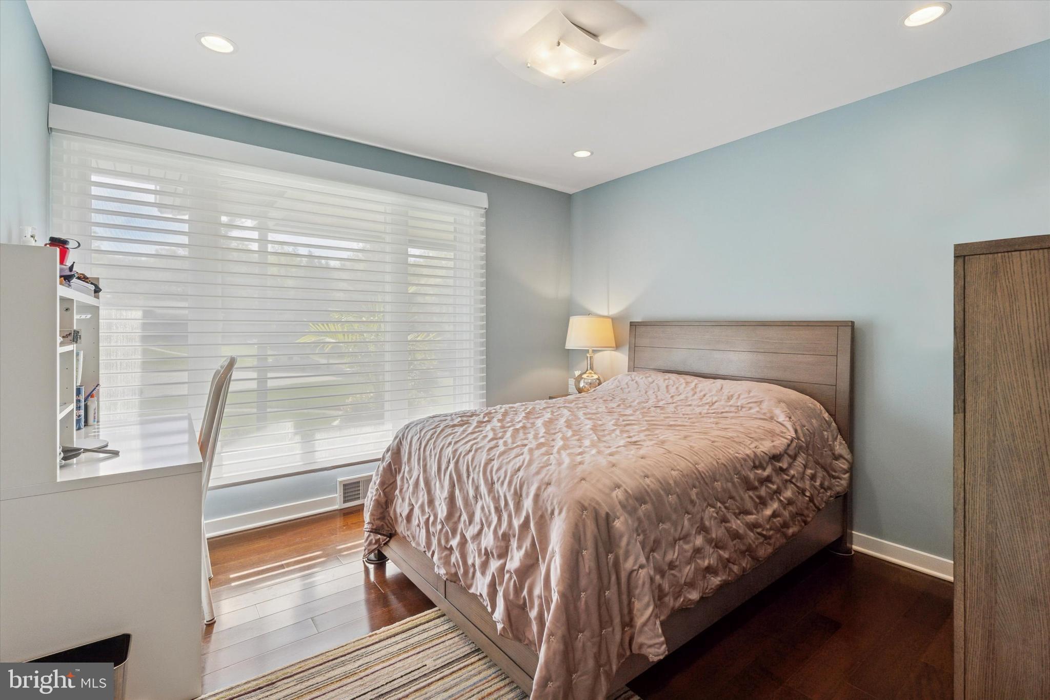 1641 Chattin Road Glenside, PA 19038 - Photo 27 of 48 a bedroom with a bed and a window