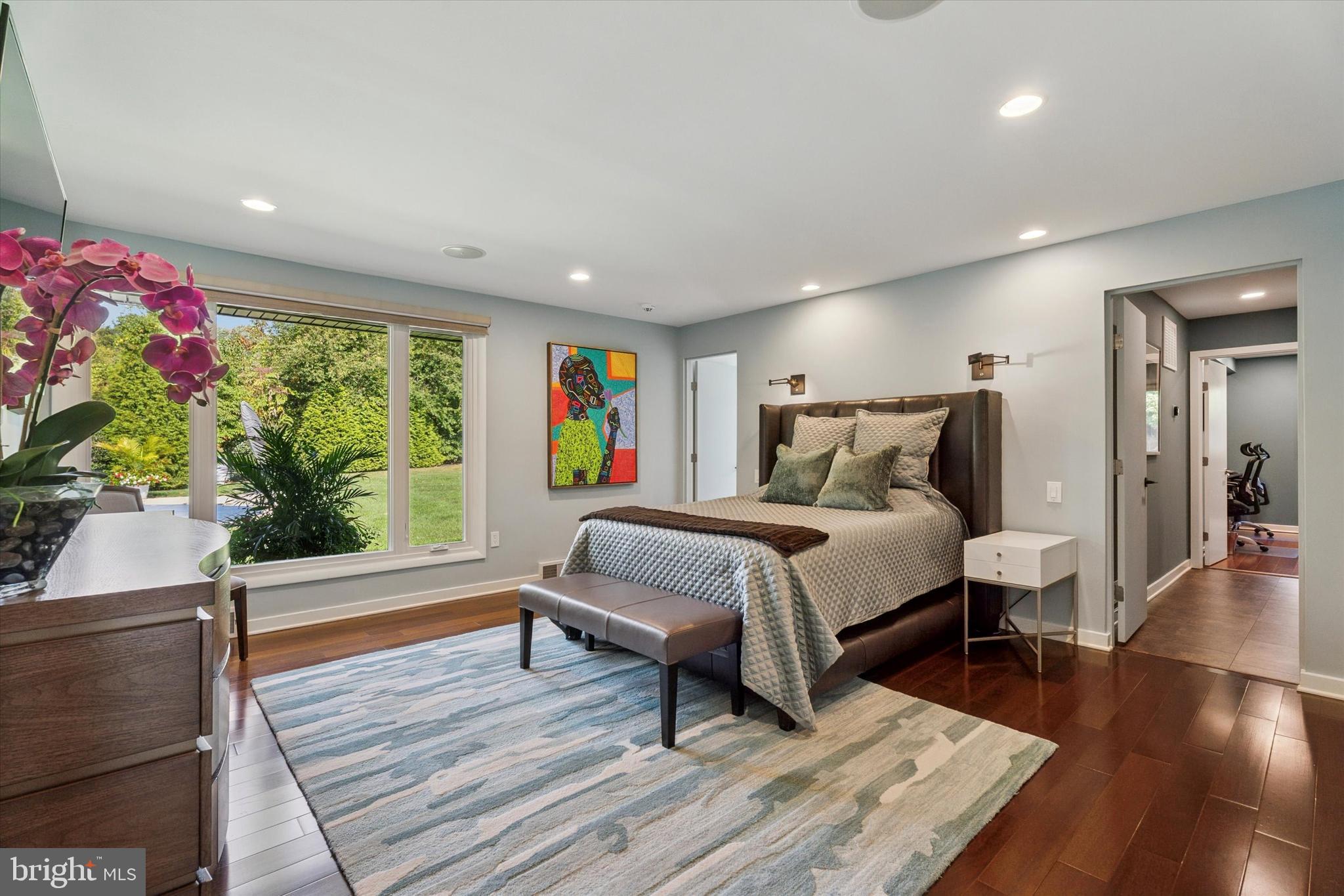 1641 Chattin Road Glenside, PA 19038 - Photo 28 of 48 a bedroom with a bed and wooden floor