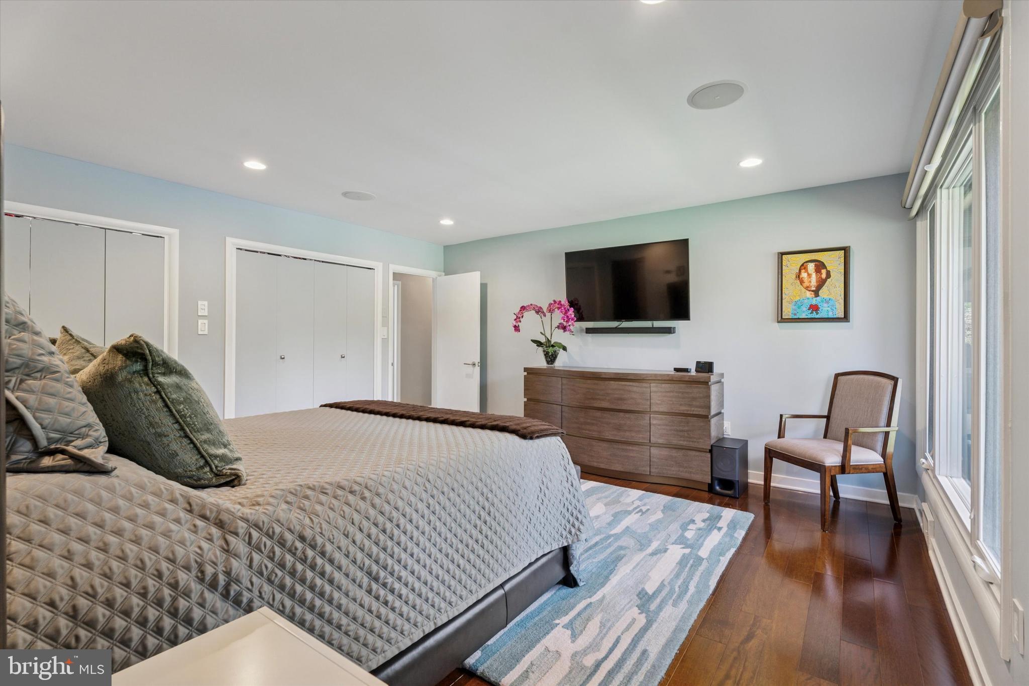 1641 Chattin Road Glenside, PA 19038 - Photo 29 of 48 a bedroom with a bed and wooden floor