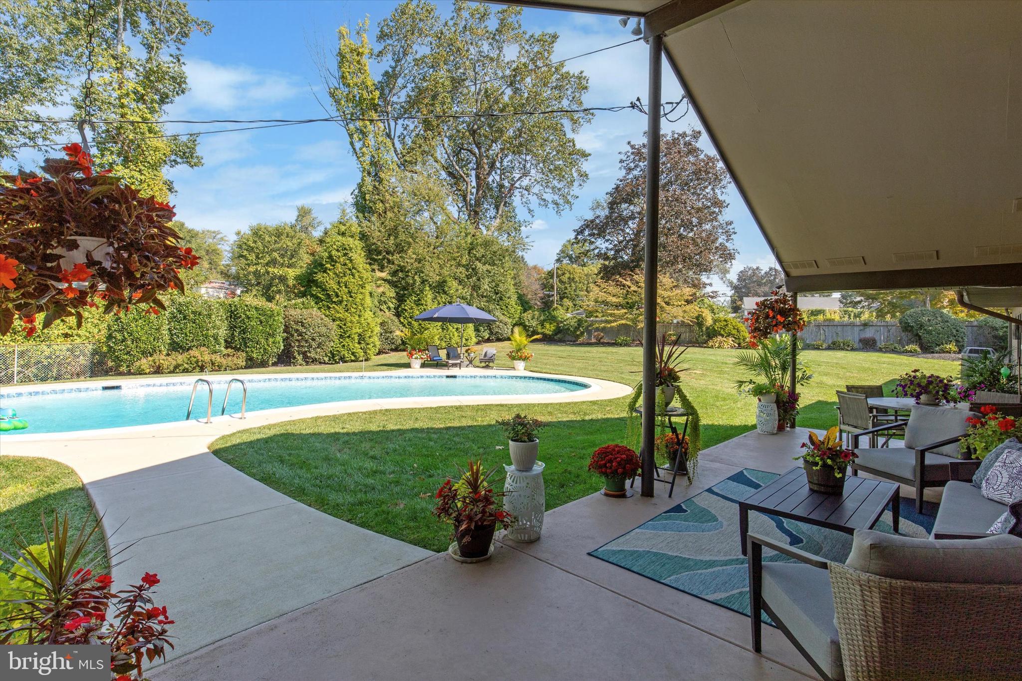 1641 Chattin Road Glenside, PA 19038 - Photo 43 of 48 a view of a swimming pool with a patio