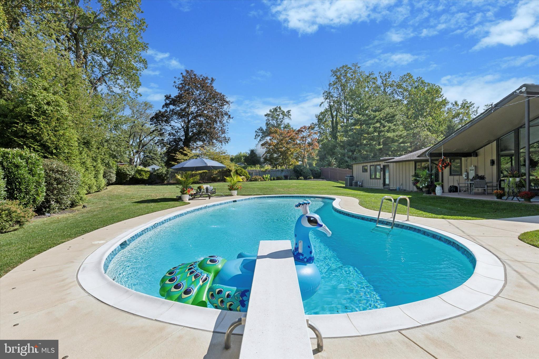 1641 Chattin Road Glenside, PA 19038 - Photo 44 of 48 a view of a swimming pool with a yard