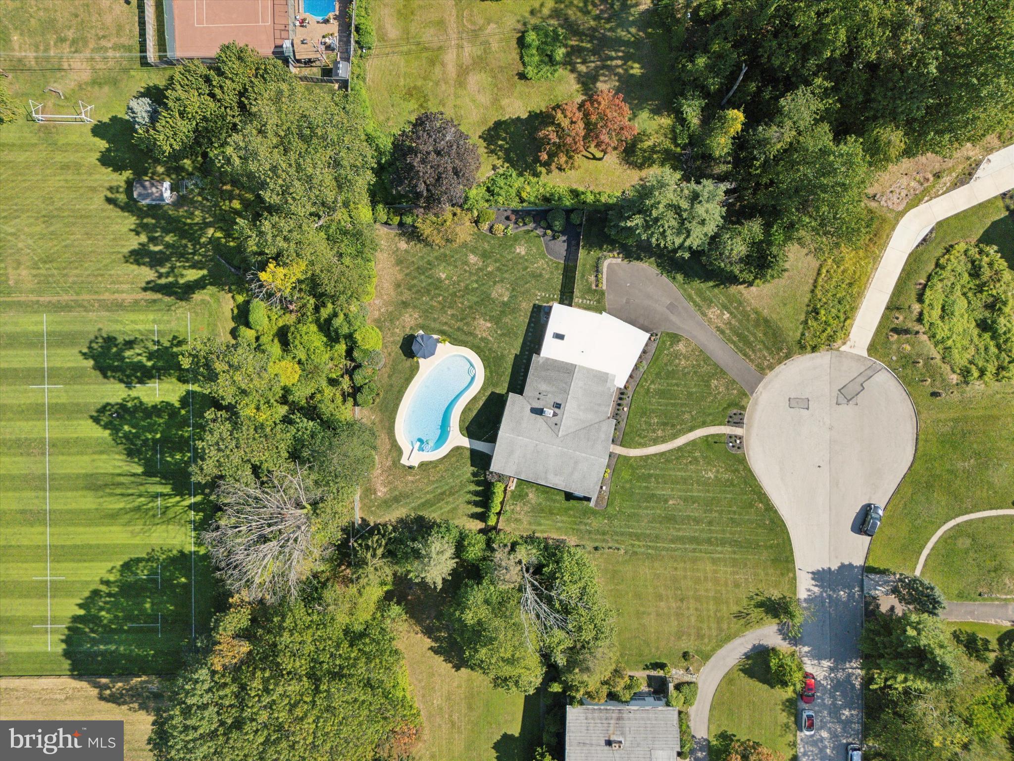 1641 Chattin Road Glenside, PA 19038 - Photo 47 of 48 an aerial view of a house with outdoor space and sitting area