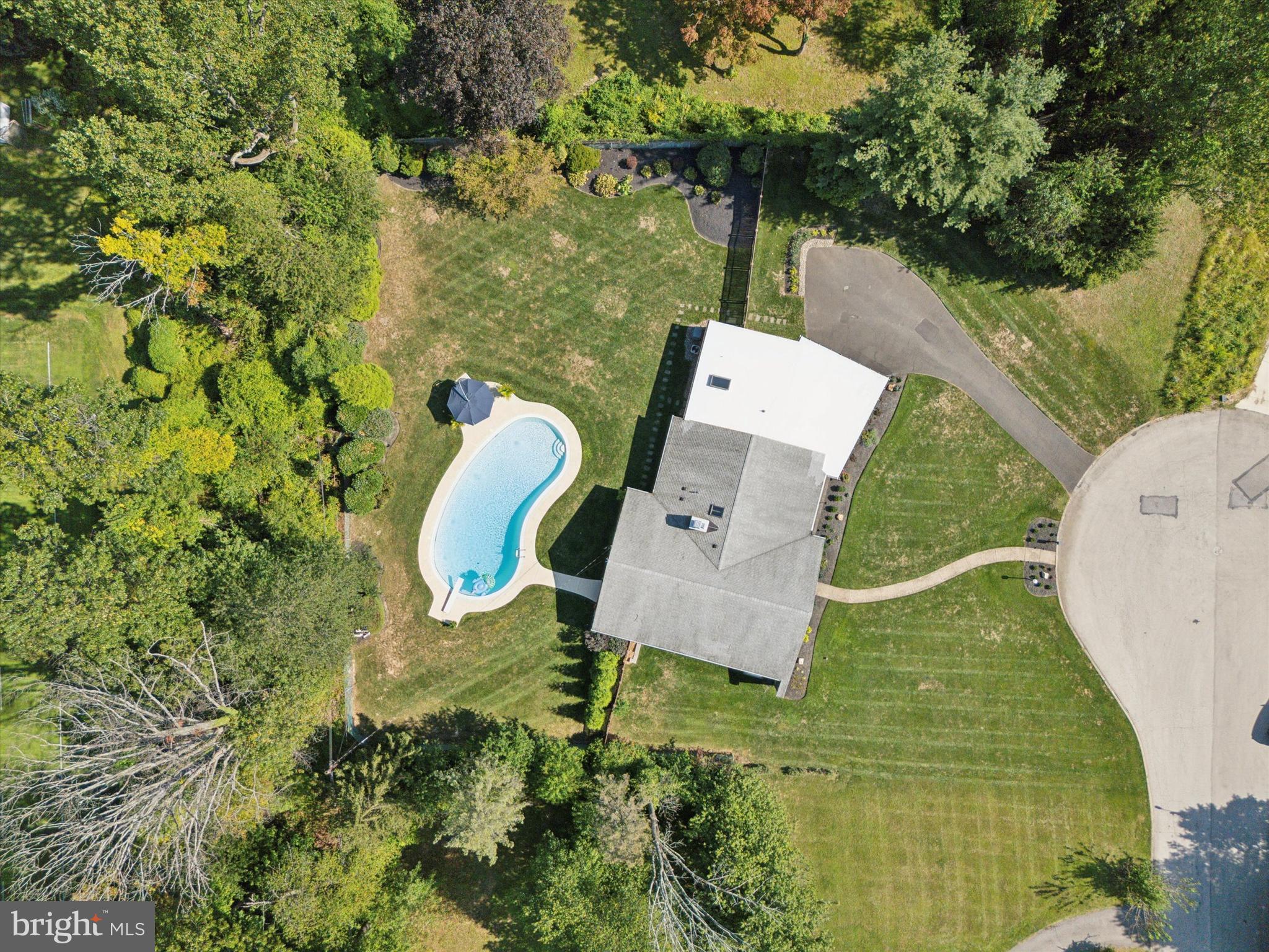 1641 Chattin Road Glenside, PA 19038 - Photo 48 of 48 an aerial view of a house with outdoor space and swimming pool
