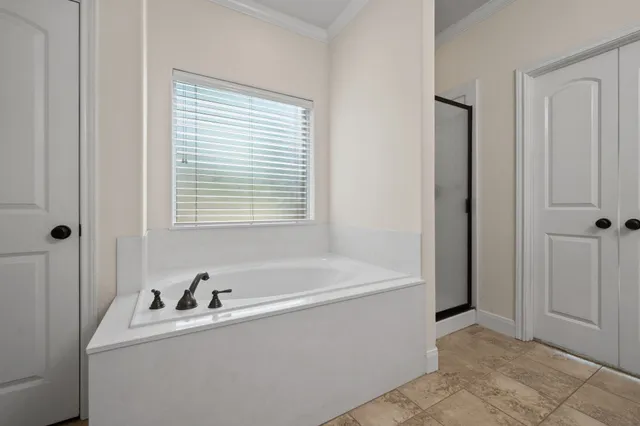 a bathroom with a sink and a bathtub