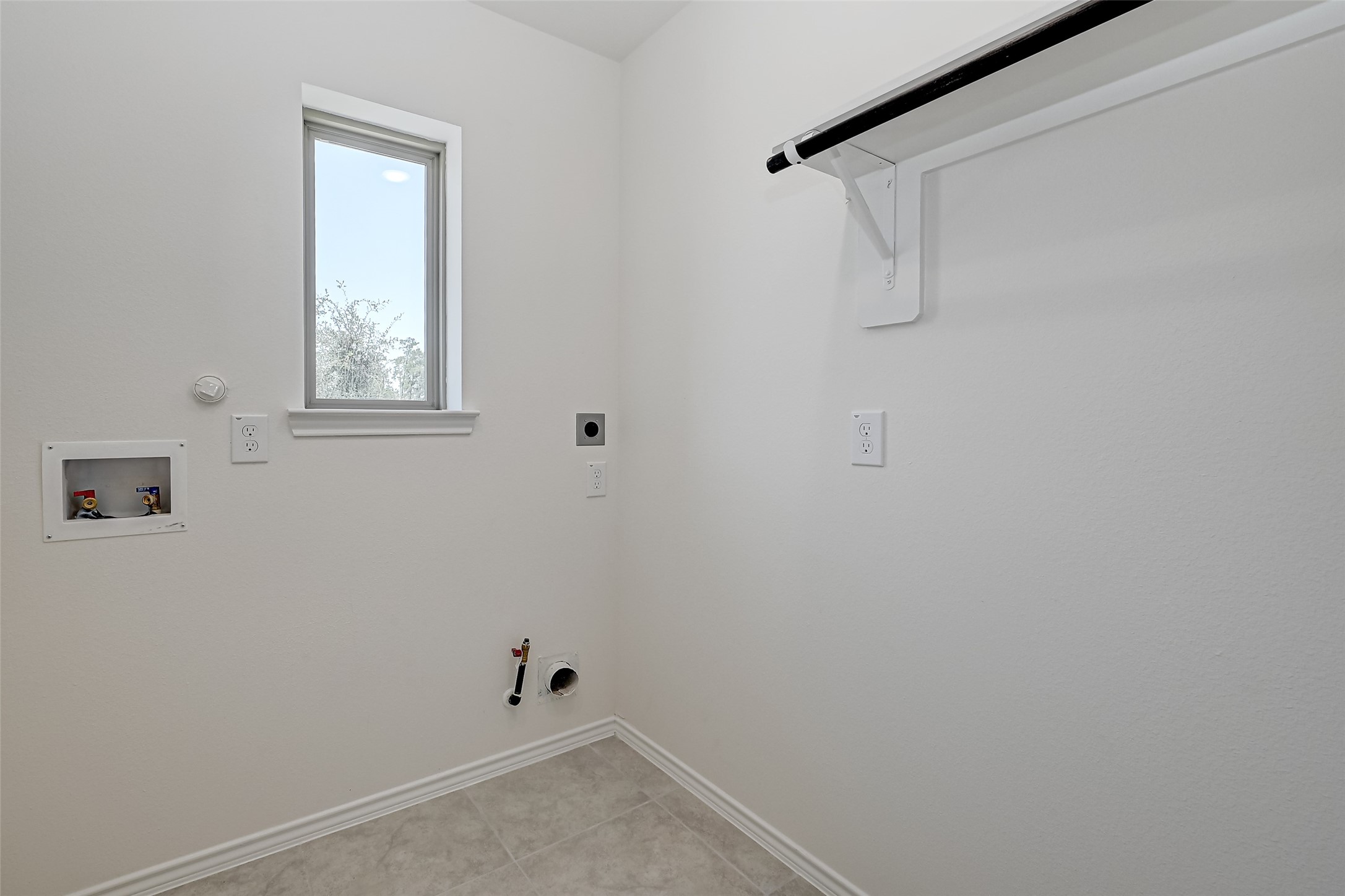 32037 Towering Birch Trail Conroe, TX 77385 - Photo 14 of 38 a view of small space with racks on the wall