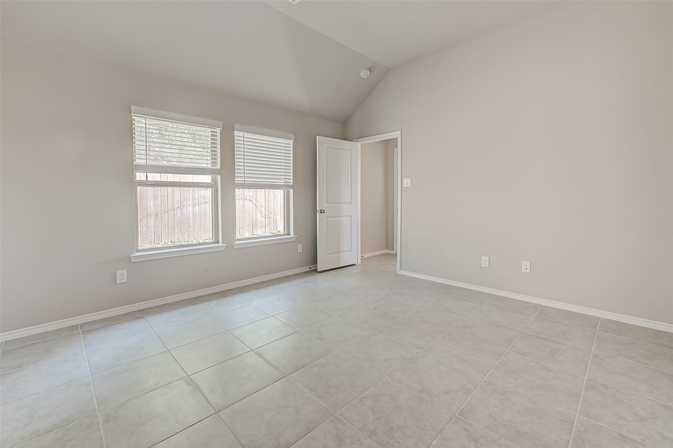 32037 Towering Birch Trail Conroe, TX 77385 - Photo 16 of 38 an empty room with windows