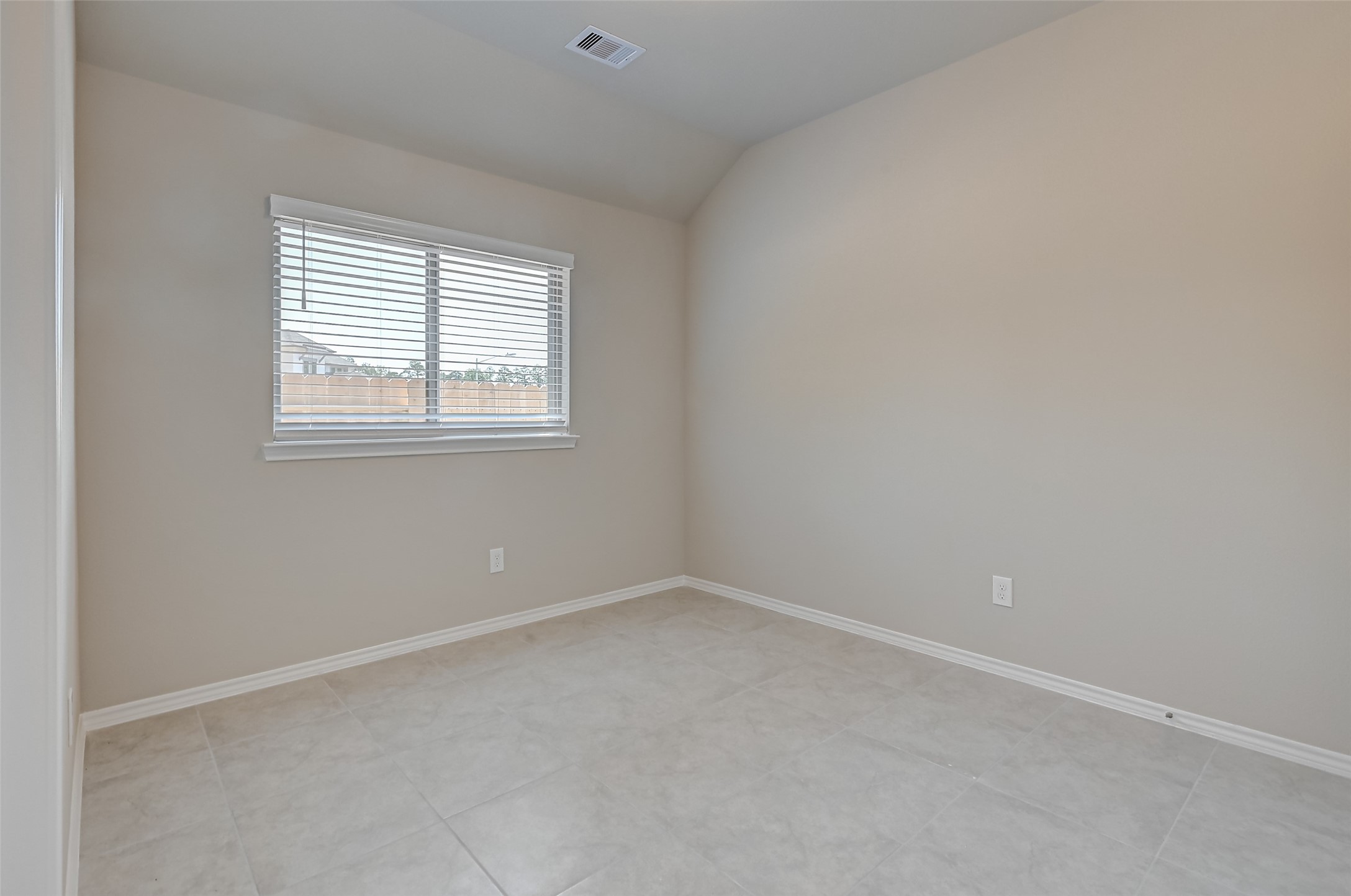 32037 Towering Birch Trail Conroe, TX 77385 - Photo 17 of 38 an empty room with a window