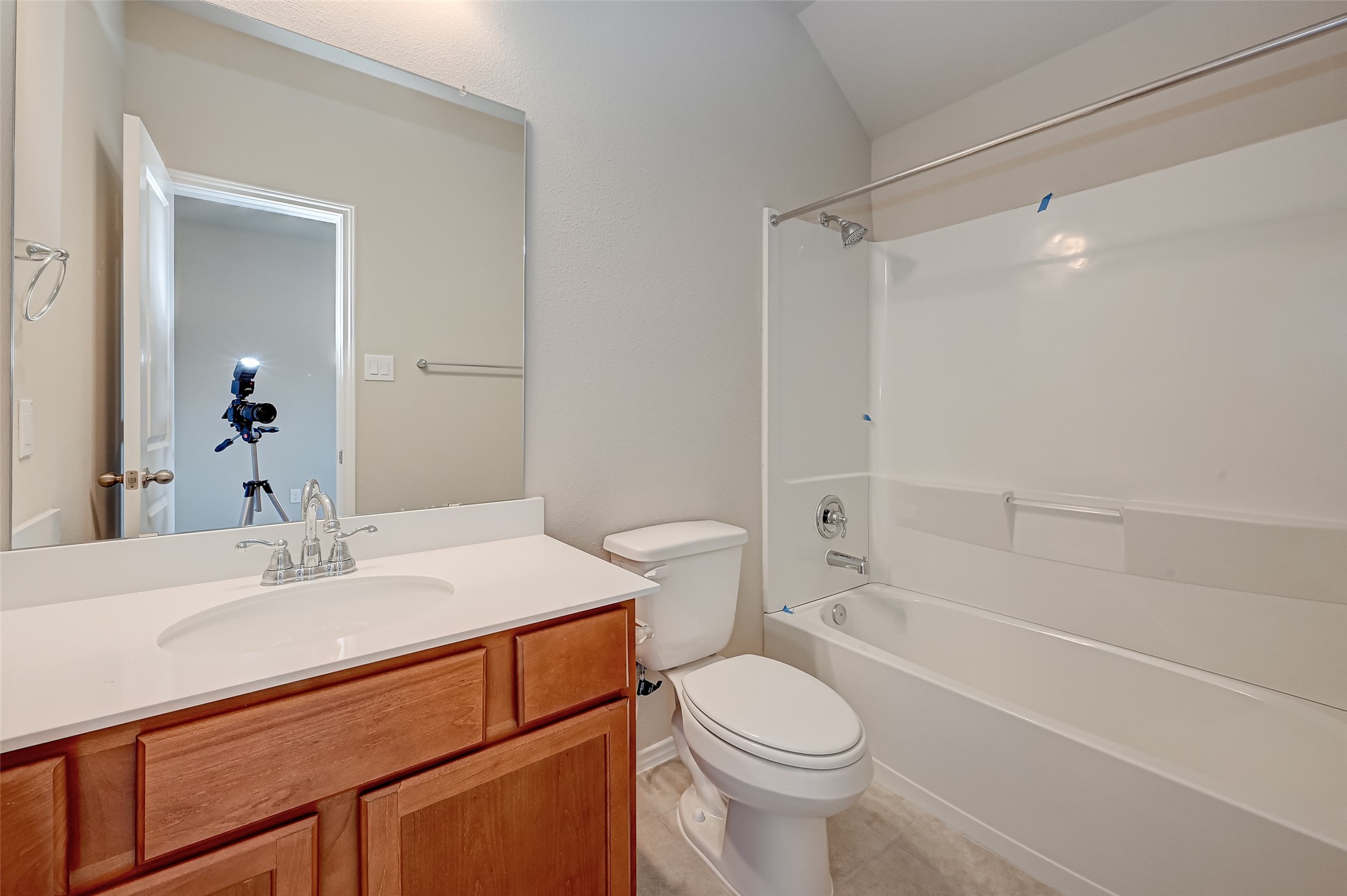 32037 Towering Birch Trail Conroe, TX 77385 - Photo 19 of 38 a bathroom with a sink toilet vanity and shower