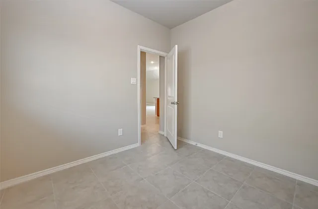 a bathroom with a sink vanity mirror and toilet