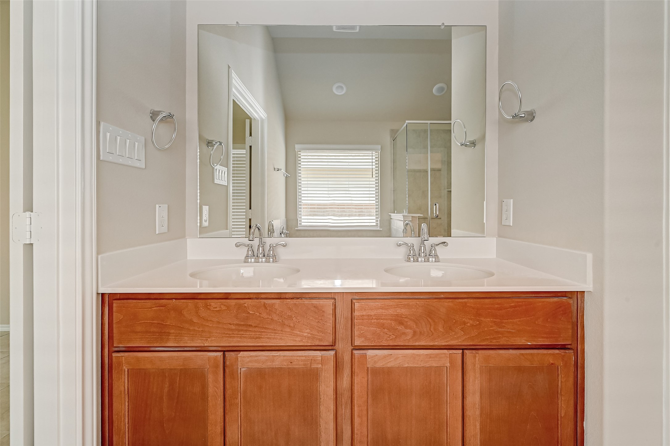 32037 Towering Birch Trail Conroe, TX 77385 - Photo 29 of 38 a bathroom with a sink and a mirror