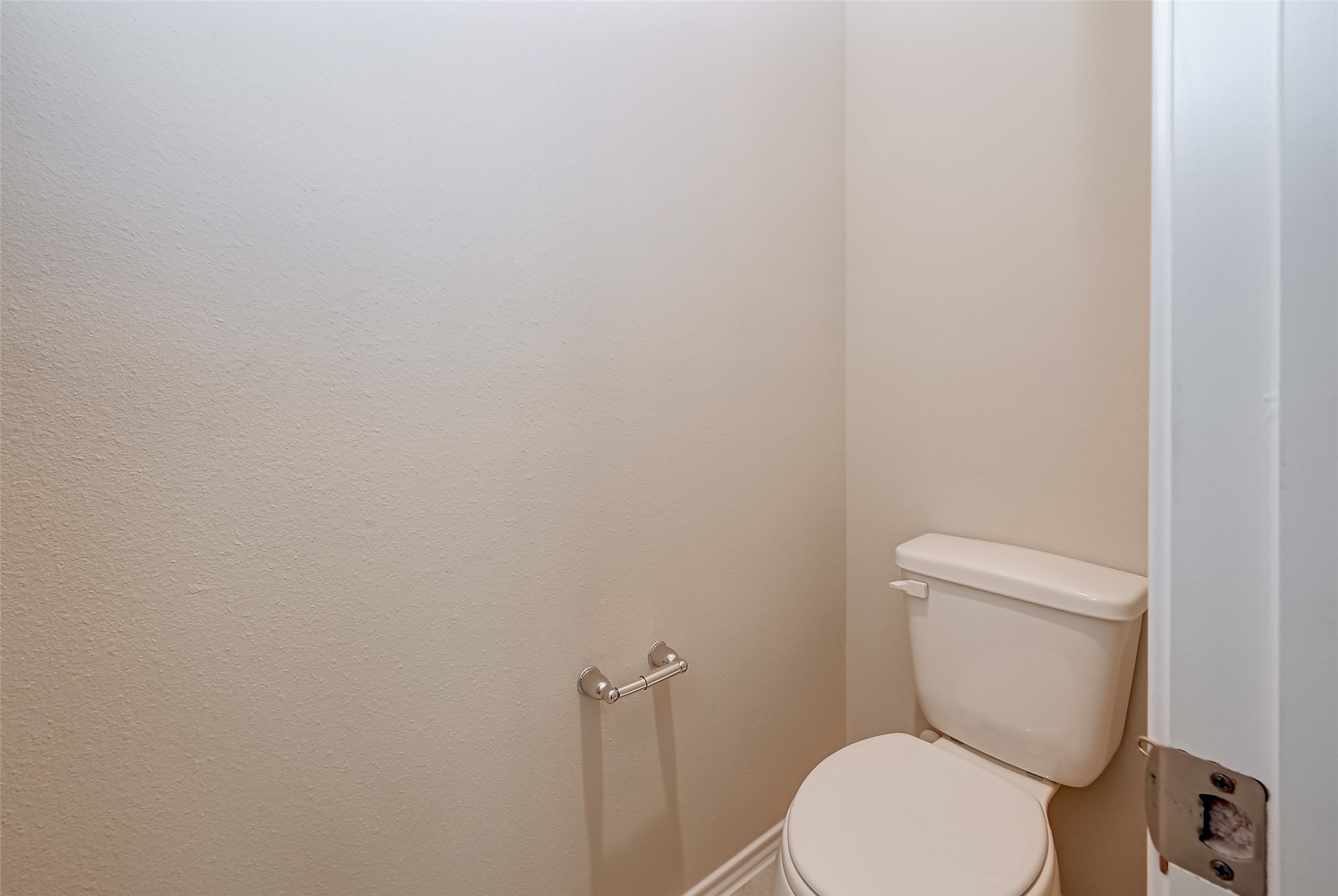 32037 Towering Birch Trail Conroe, TX 77385 - Photo 30 of 38 a white toilet sitting next to a white wall