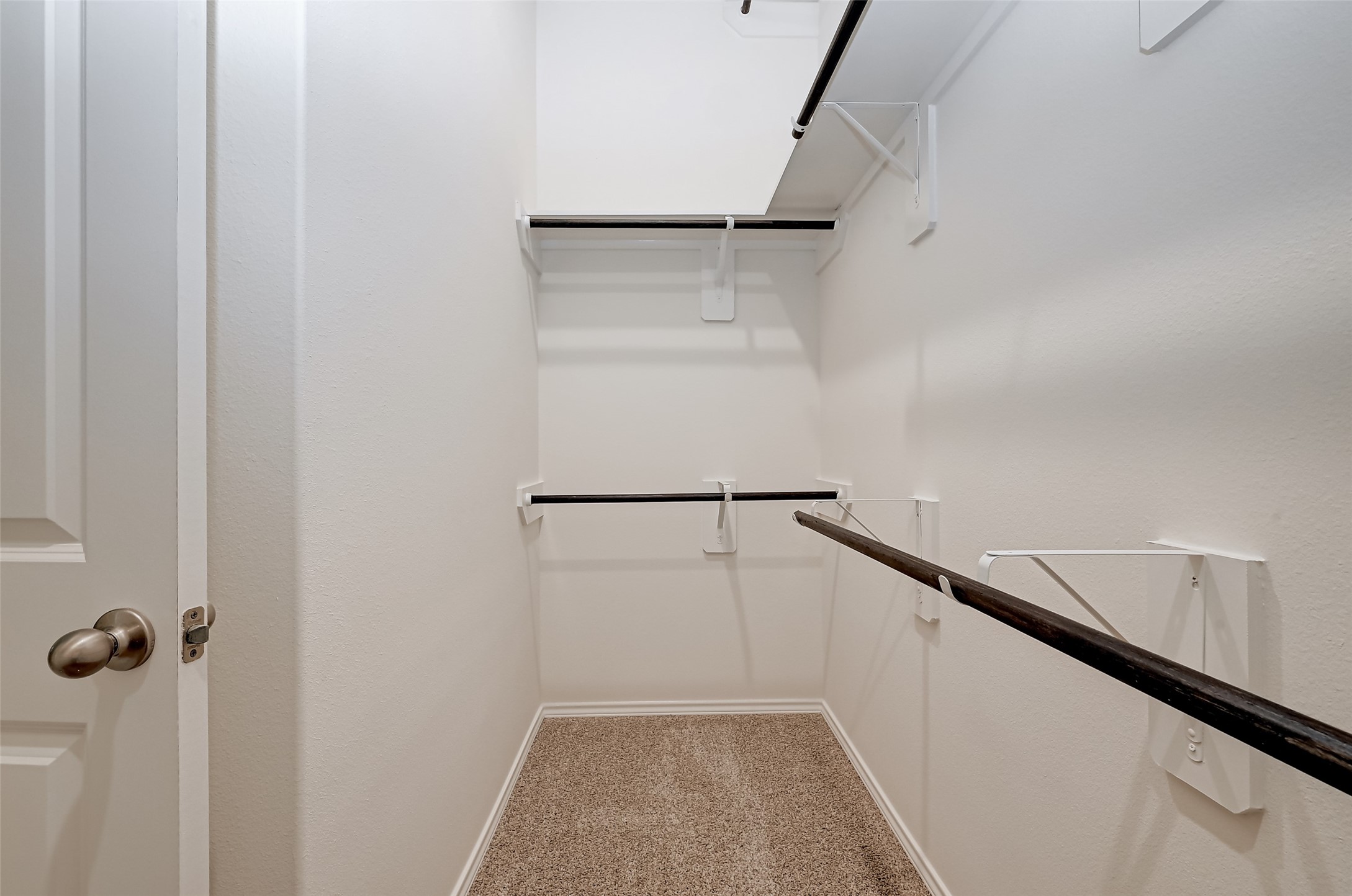 32037 Towering Birch Trail Conroe, TX 77385 - Photo 32 of 38 a view of an empty walk in closet