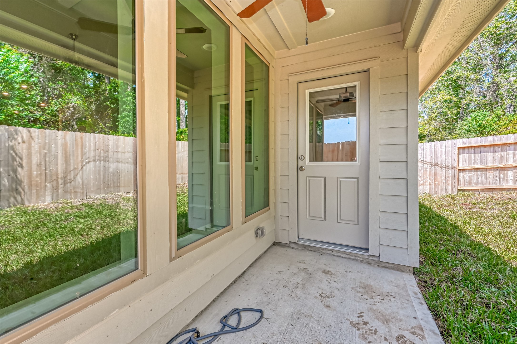 32037 Towering Birch Trail Conroe, TX 77385 - Photo 34 of 38 a view of a house with a porch