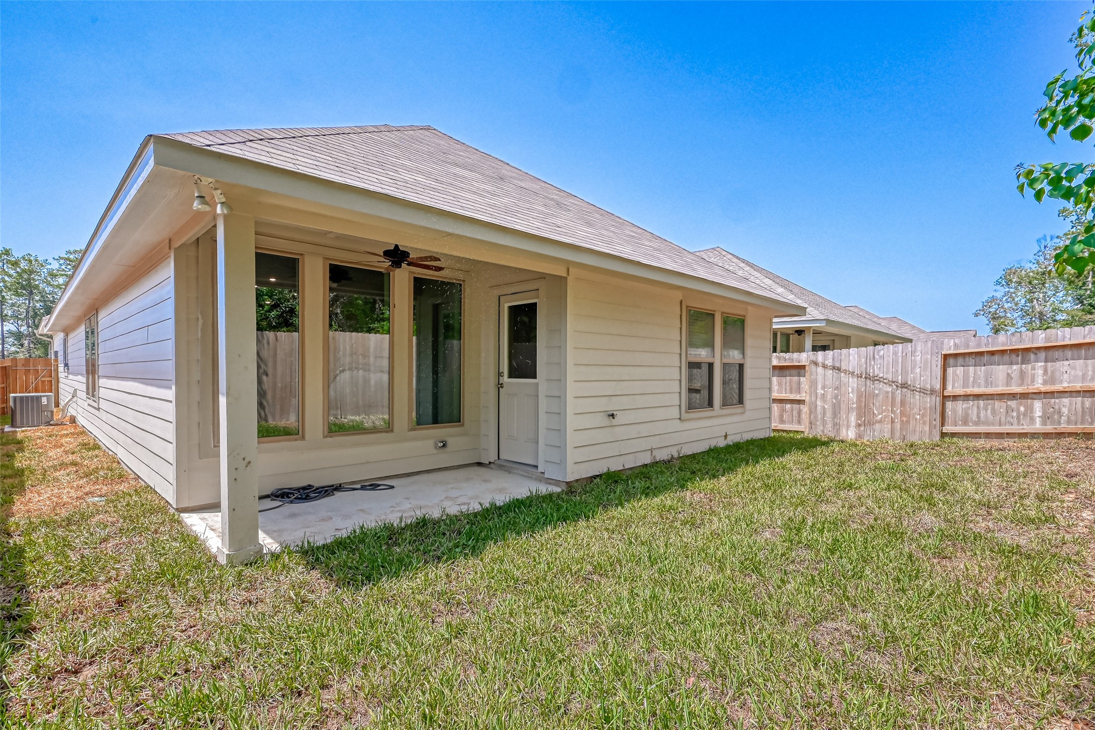 32037 Towering Birch Trail Conroe, TX 77385 - Photo 36 of 38 a view of a house with backyard