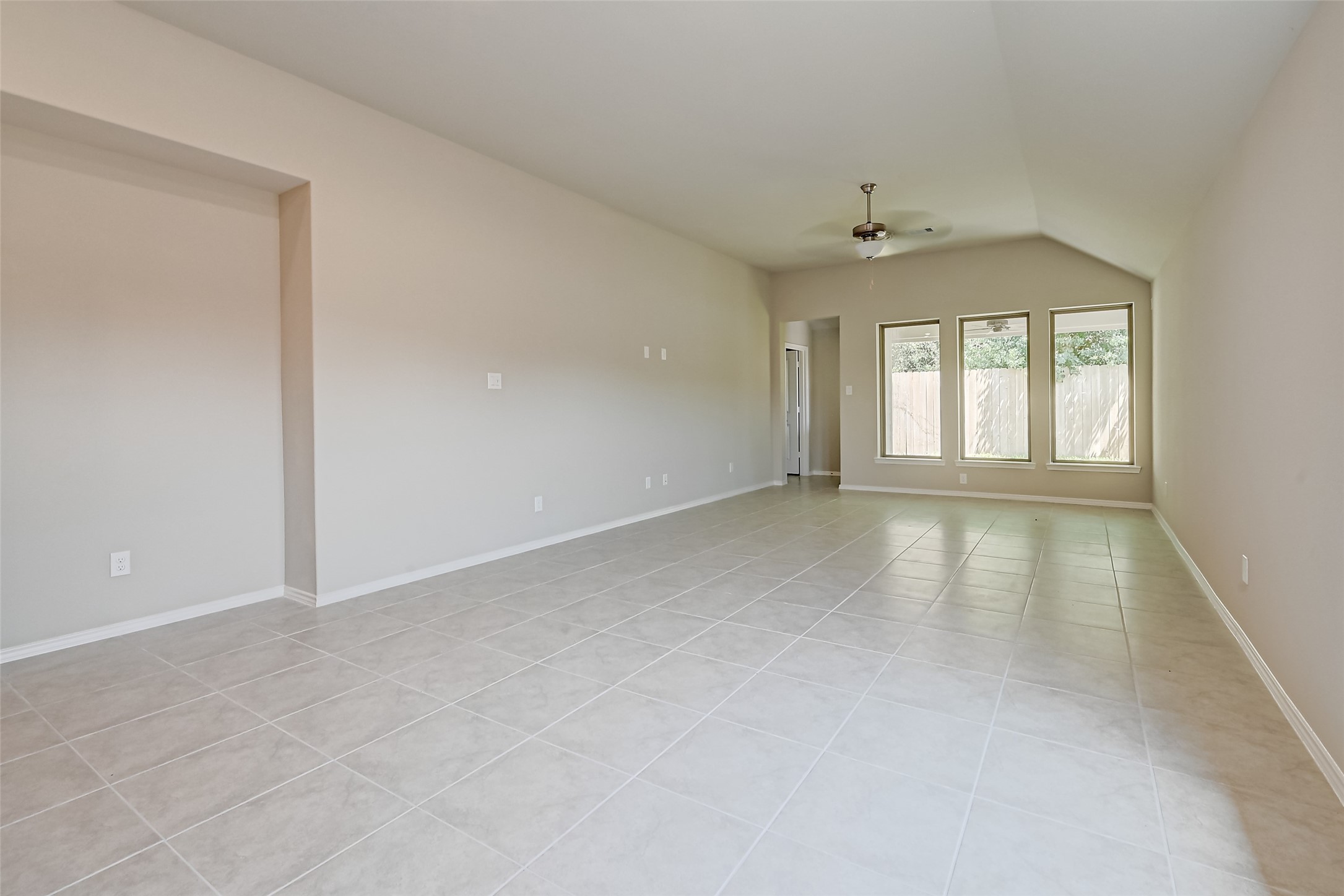 32037 Towering Birch Trail Conroe, TX 77385 - Photo 6 of 38 an empty room with windows and closet