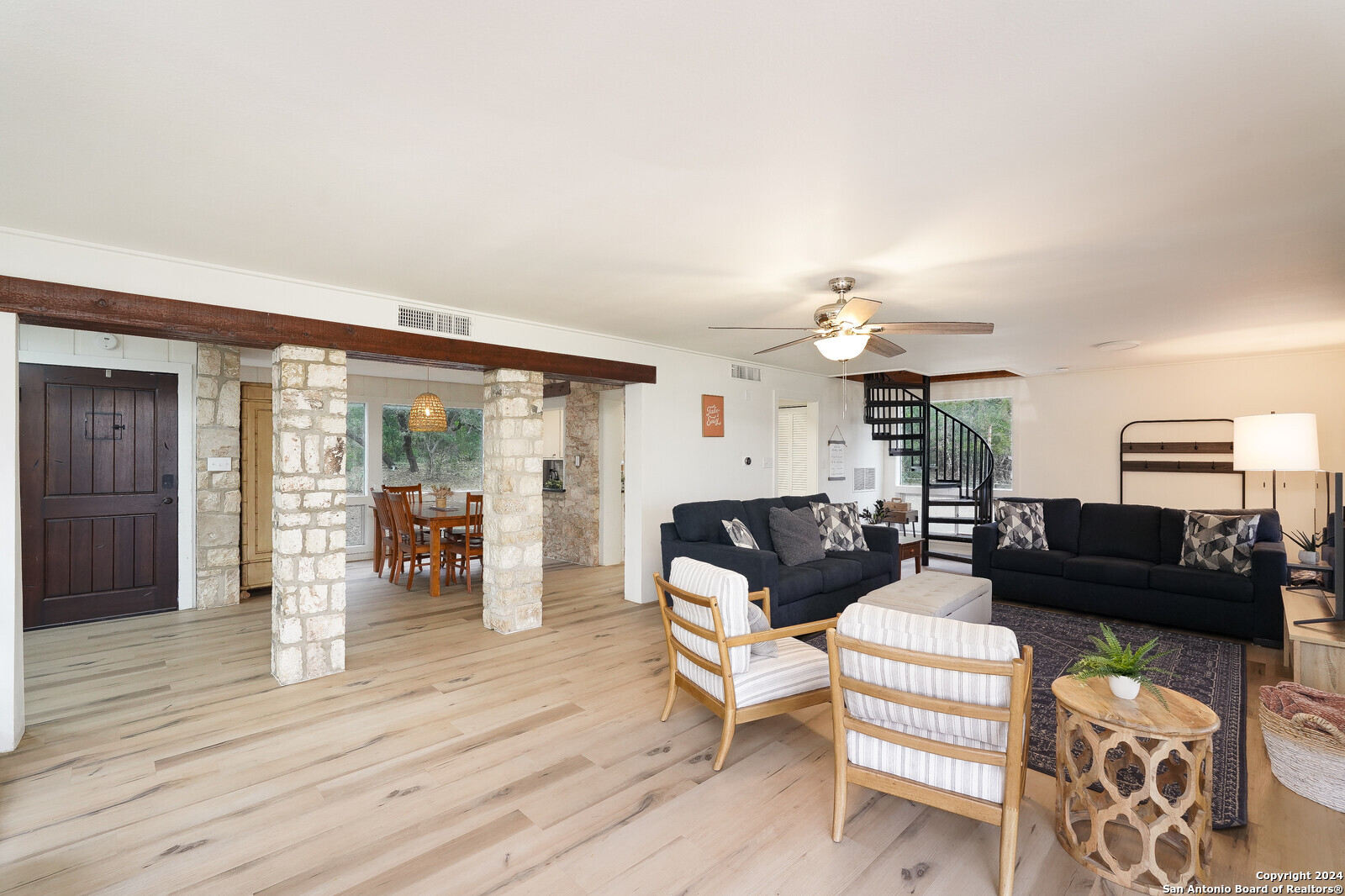 550 County Road 262 Mico, TX 78056 - Photo 14 of 58 a living room with furniture and wooden floor