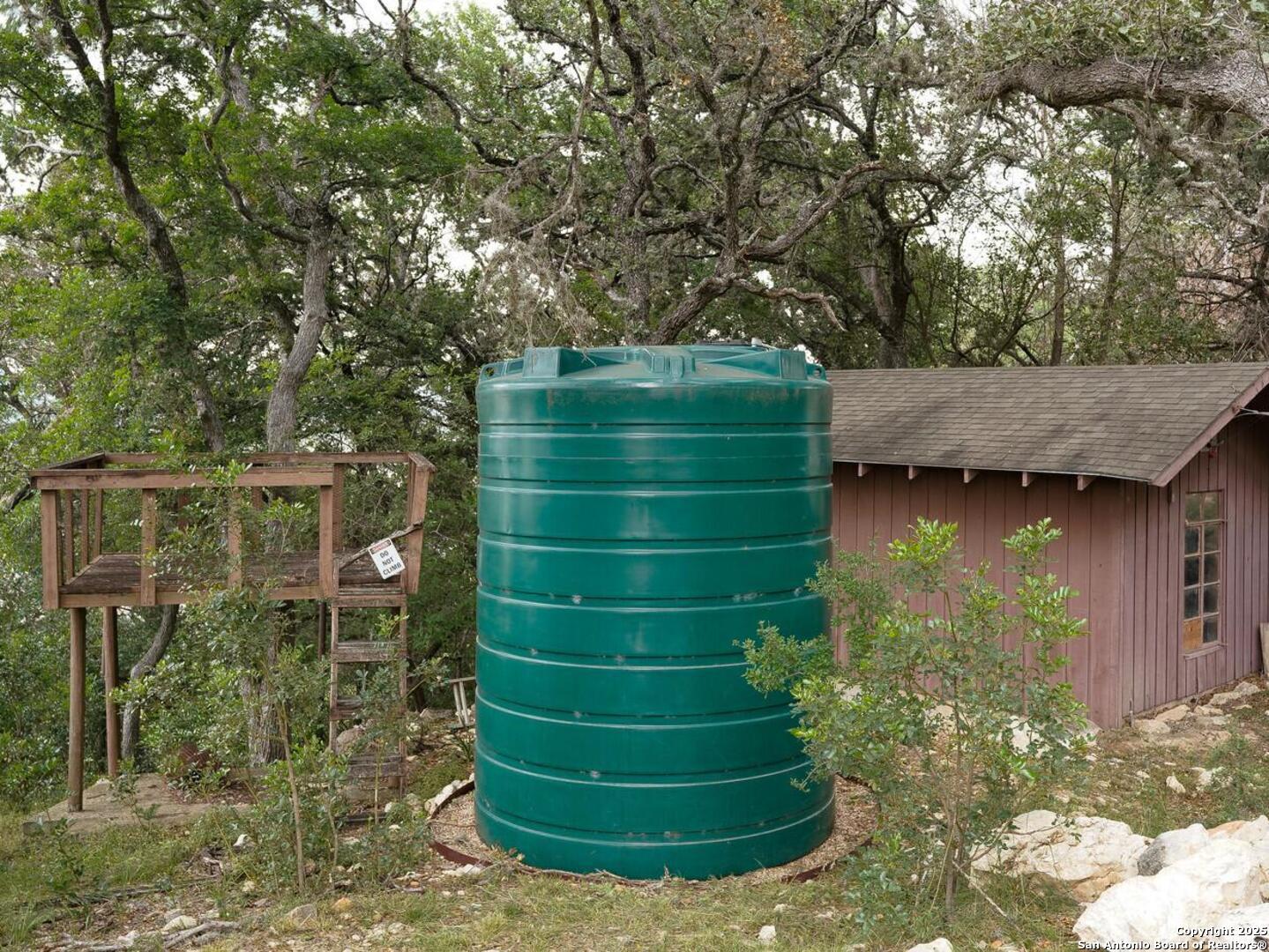 550 County Road 262 Mico, TX 78056 - Photo 42 of 58 a view of a backyard