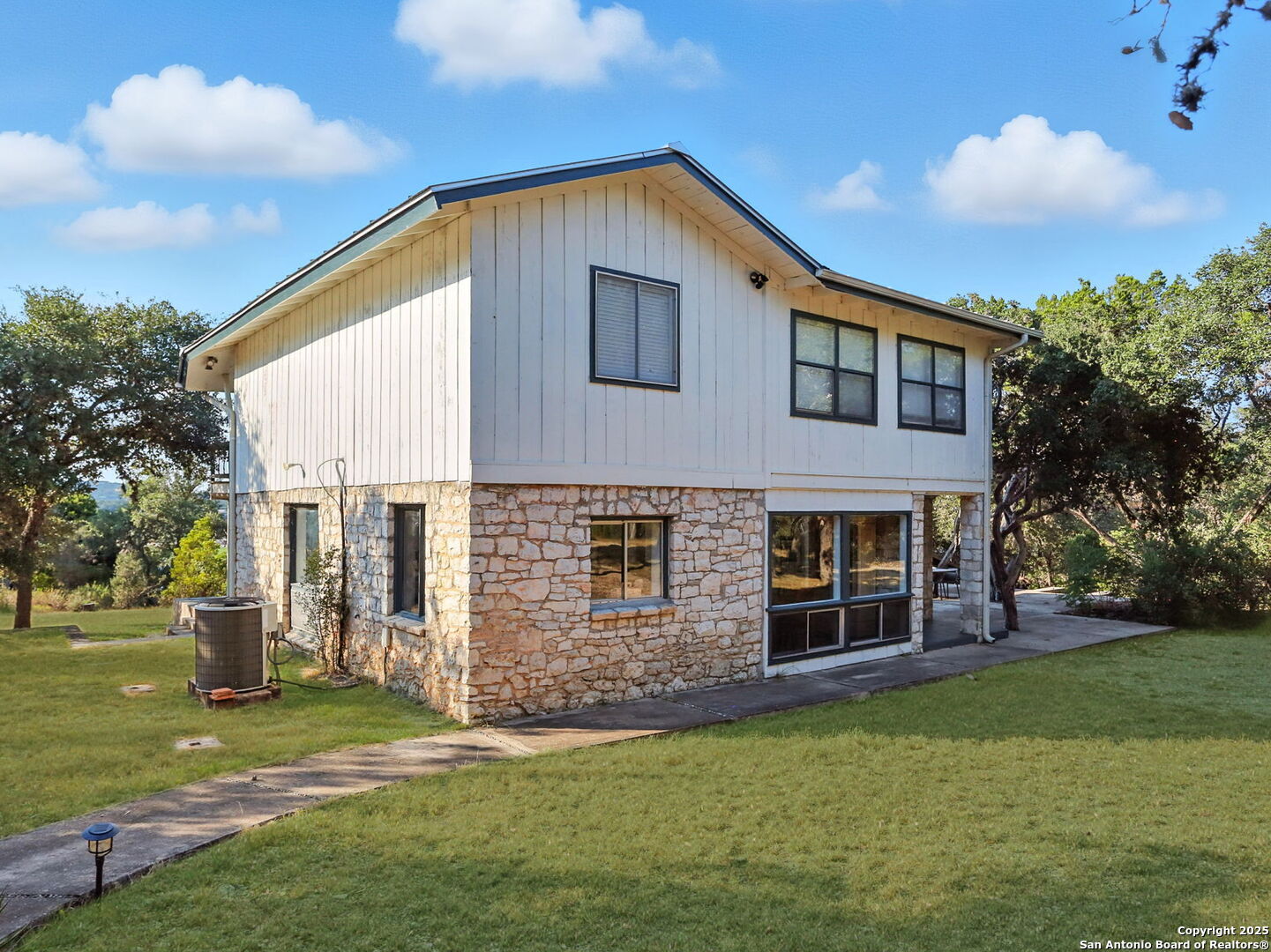 550 County Road 262 Mico, TX 78056 - Photo 49 of 58 a front view of house with yard
