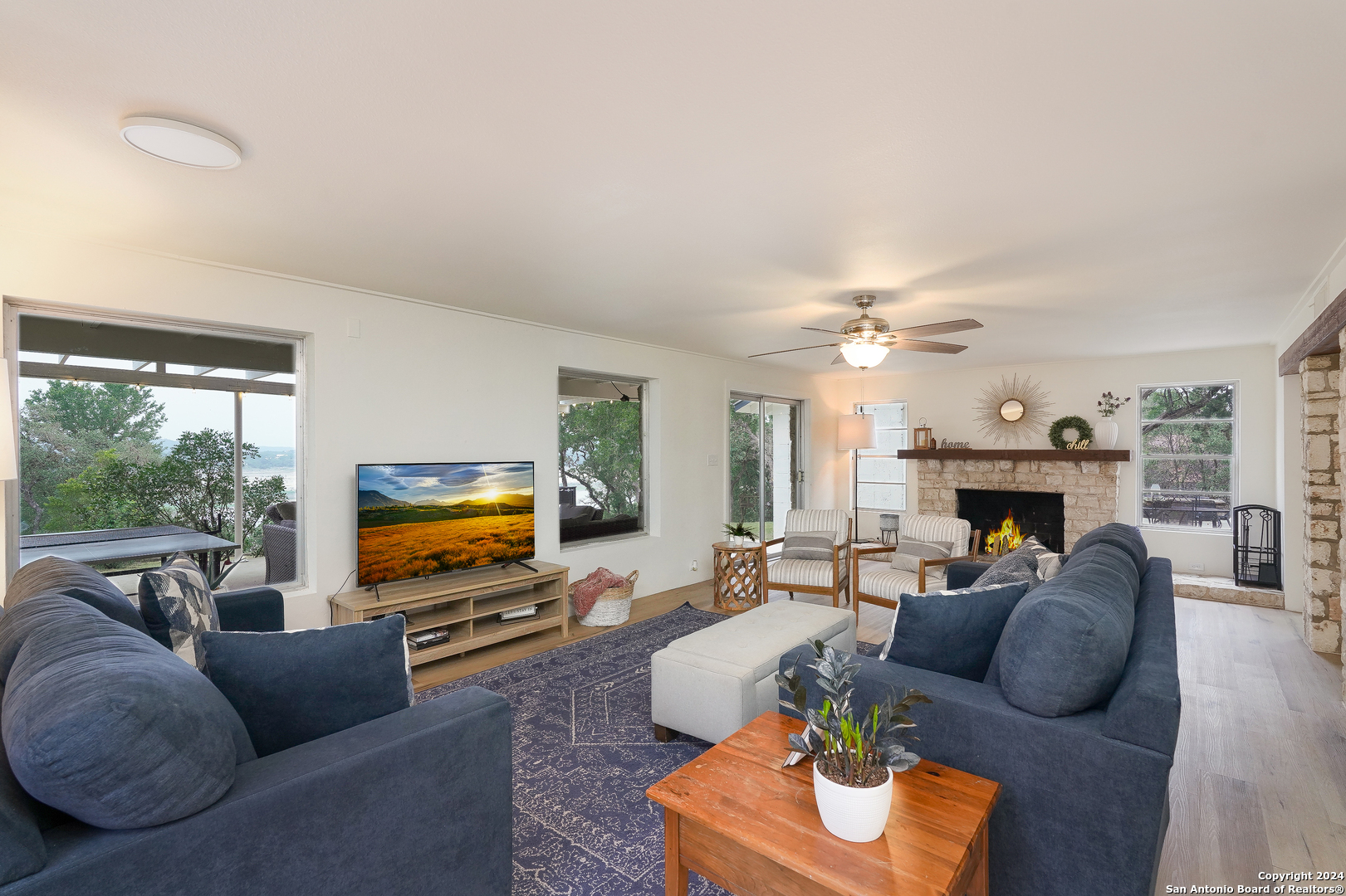 550 County Road 262 Mico, TX 78056 - Photo 8 of 58 a living room with furniture and a fireplace