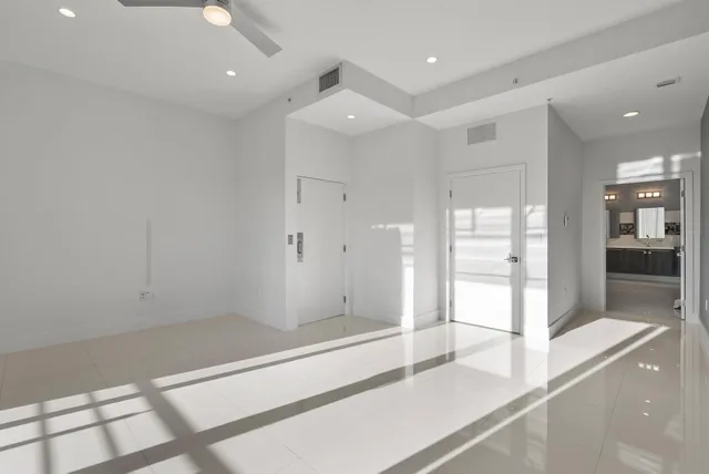 a view of a balcony with chairs