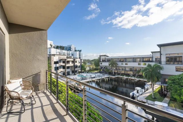 a bathroom with double sink and a mirror
