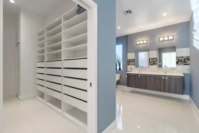 a bathroom with a bathtub and shower