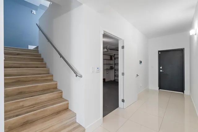 a view of an entryway with hallway