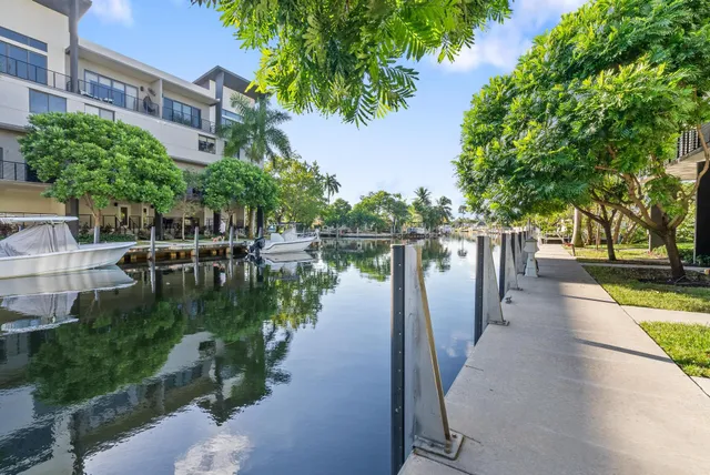 a view of a street with lots of fruit and vegetables