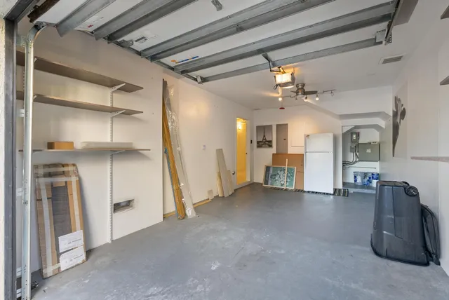 a view of entryway and hall with dining area