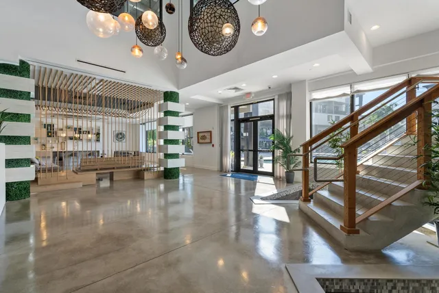 a view of a building with table and chairs