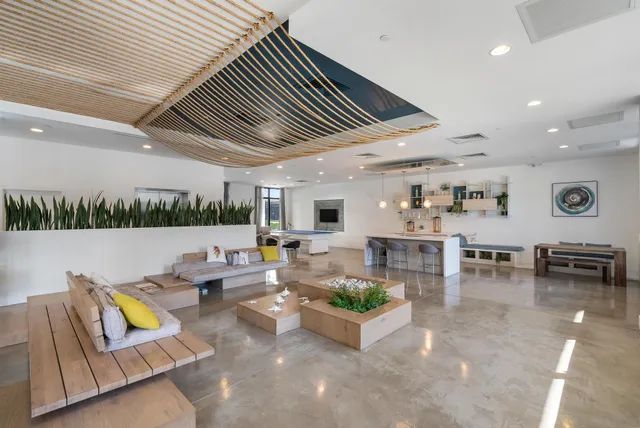 a view of a swimming pool and a chairs