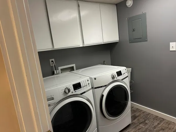 a utility room with dryer and washer