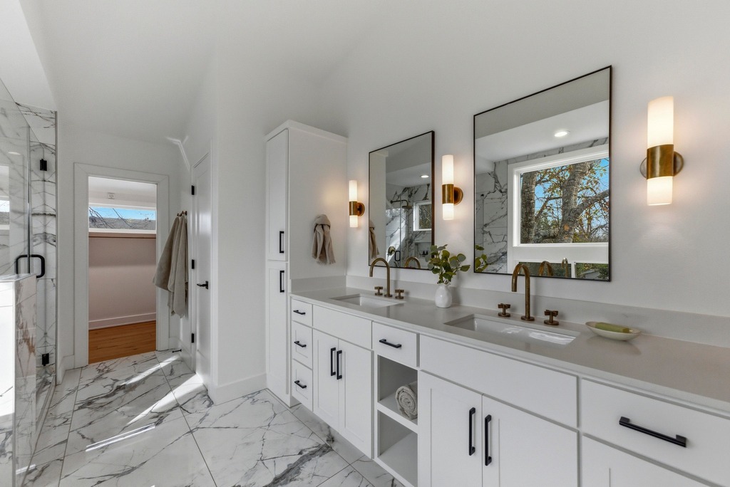 1301 Madison Avenue Austin, TX 78757 - Photo 23 of 39 a bathroom with double sink and a mirror