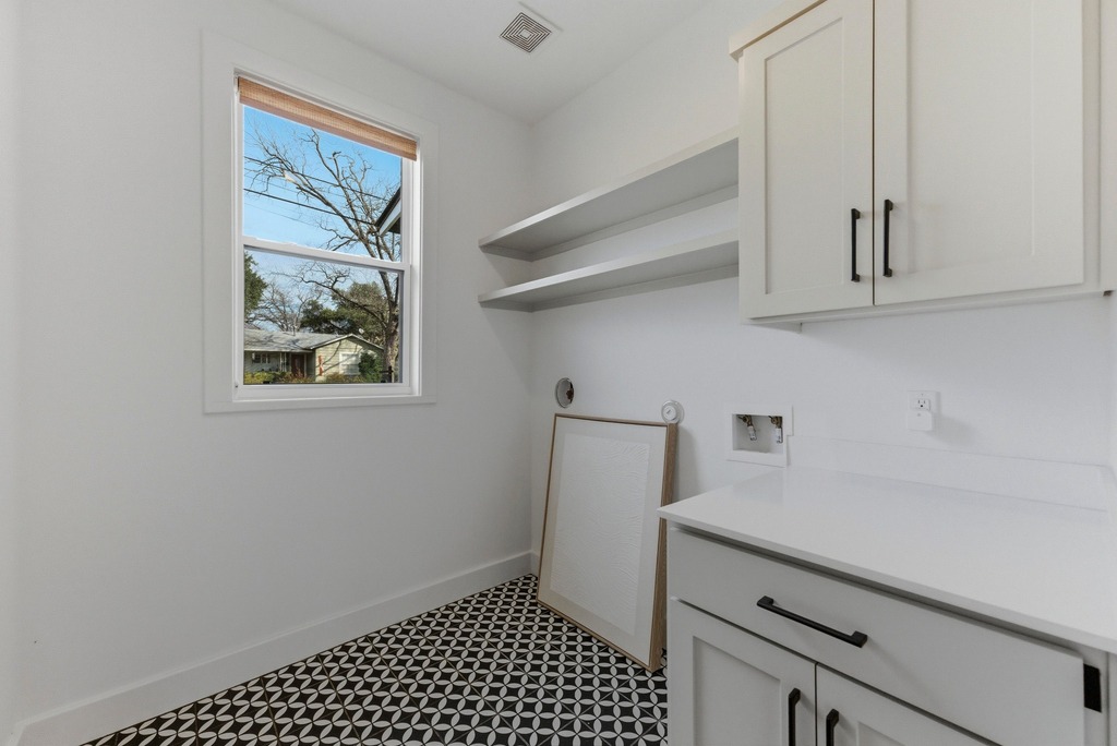 1301 Madison Avenue Austin, TX 78757 - Photo 33 of 39 a room with storage and utility