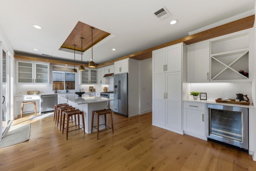1301 Madison Avenue Austin, TX 78757 - Photo 8 of 39 a view of a dining room with furniture window and wooden floor