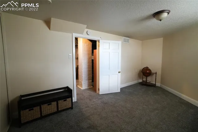 a room that has a bed and a window