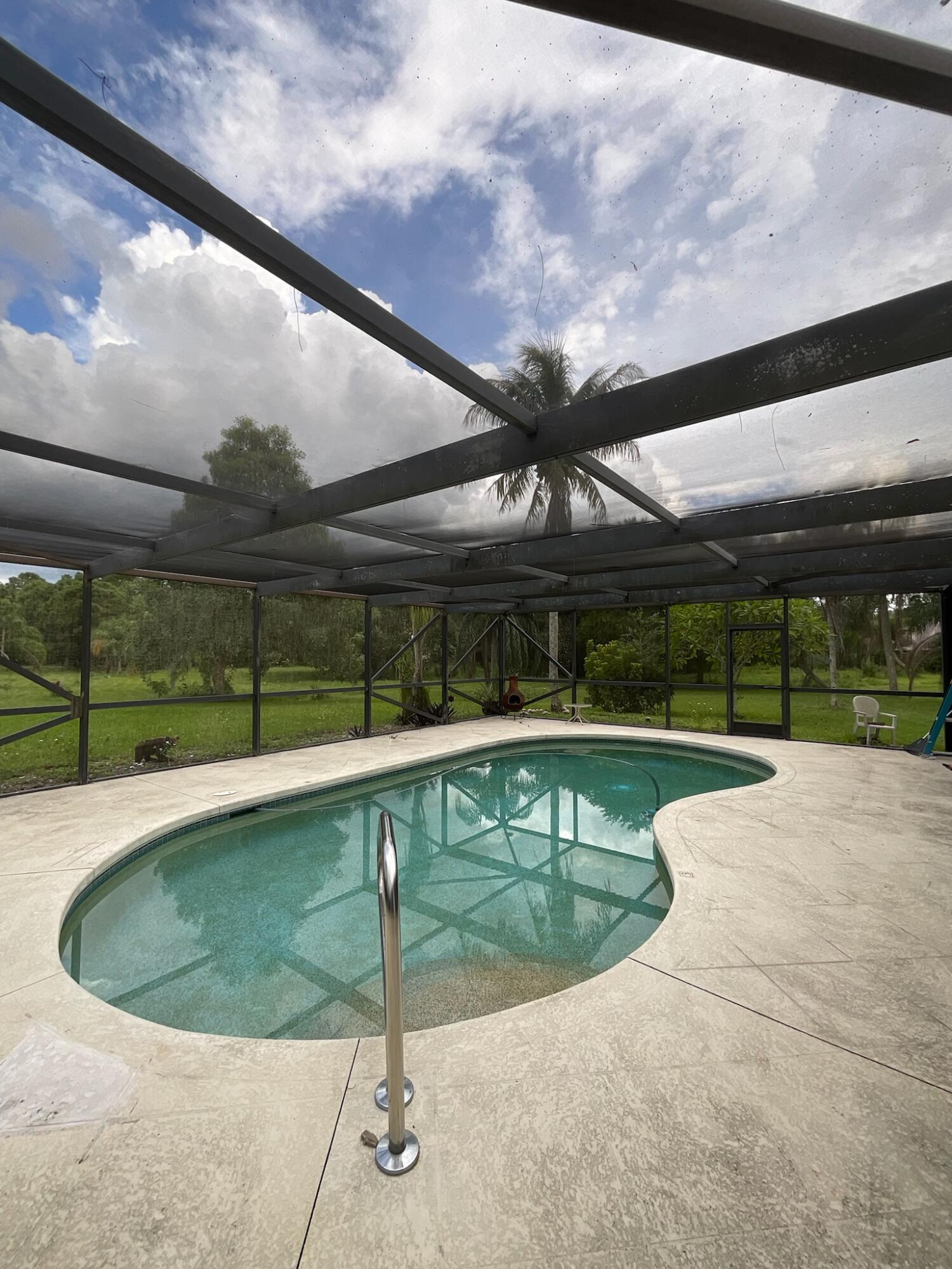 3208 A Road Loxahatchee Groves, FL 33470 - Photo 1 of 41 IMG_1928