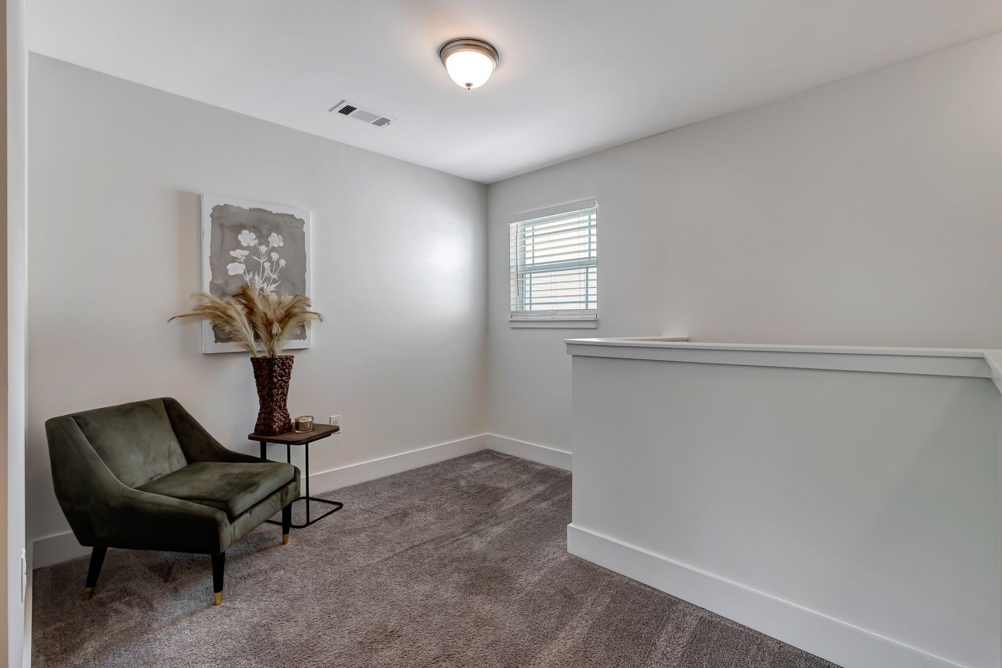 1134 Somerset Springs Drive Spring Hill, TN 37174 - Photo 14 of 28 a living room with furniture and a window