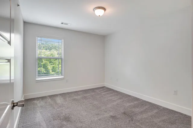 an empty room with a window