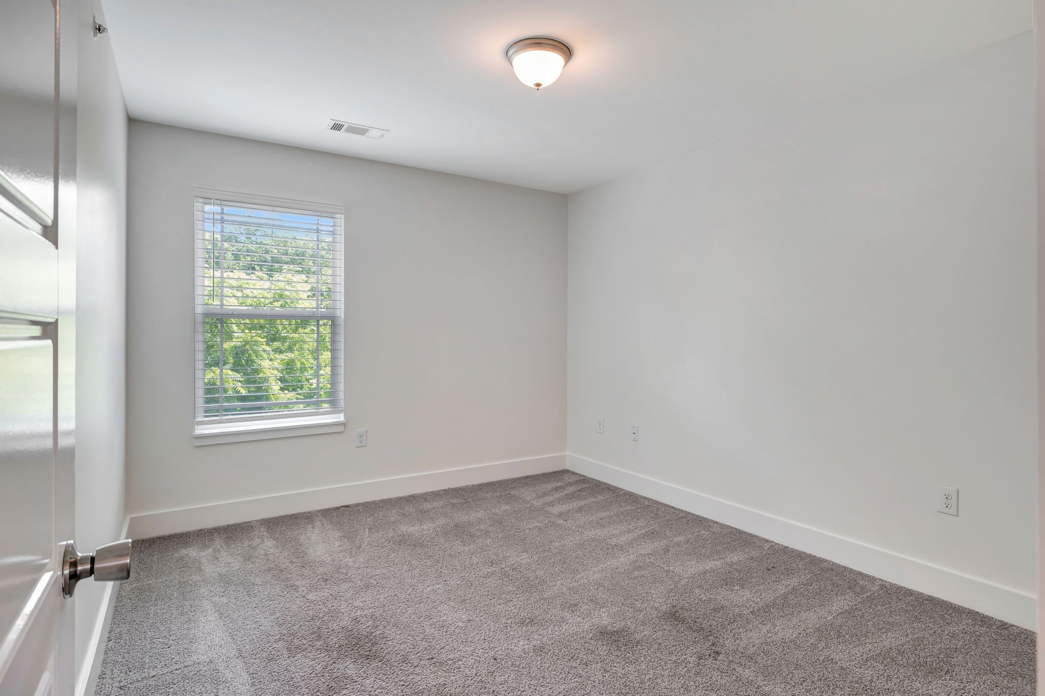 1134 Somerset Springs Drive Spring Hill, TN 37174 - Photo 21 of 28 an empty room with a window